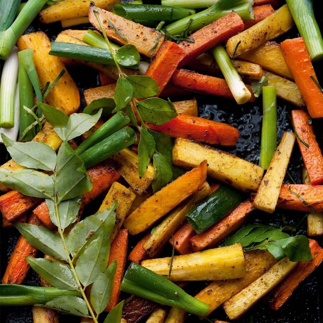 Curry roasted swede, parsnips and carrots with lime